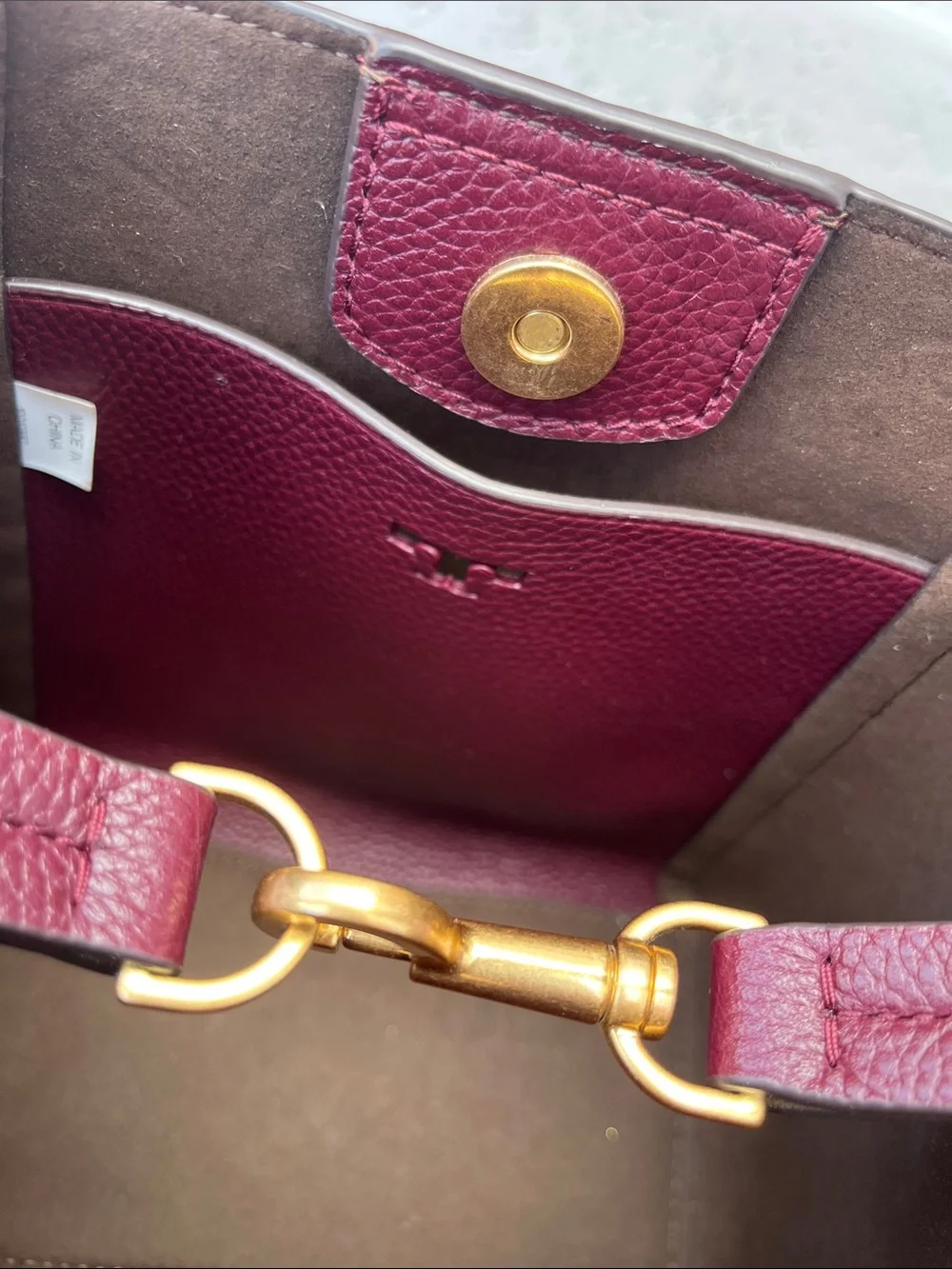 Brand new Tory Burch Burgundy and White Monogram Jacquard Bucket Crossbody